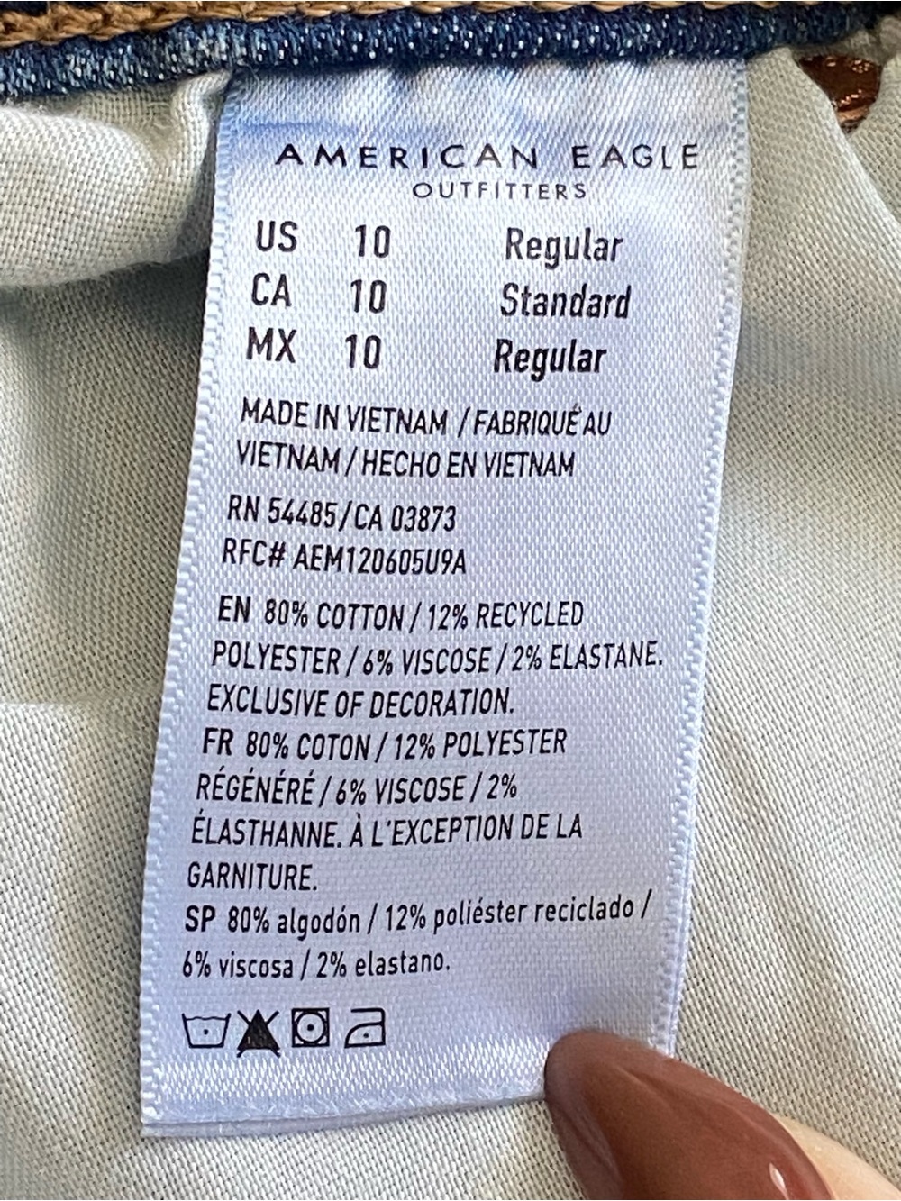 American Eagle Next Level Stretch Flare Jeans Side Slit Studded Hem Size 10 - Picture 11 of 16